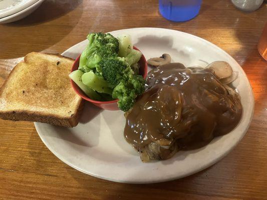 Hamburger steak dinner, comes with a salad