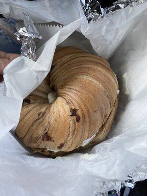 Cinnamon raisin bagel with fat free cream cheese.