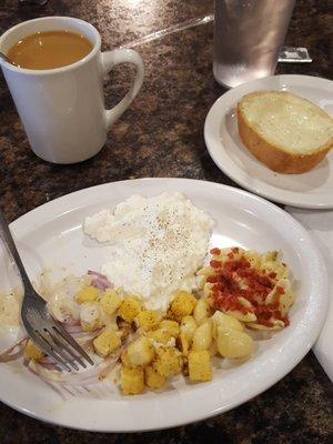 Cottage cheese, croutons, pasta salad and bread.