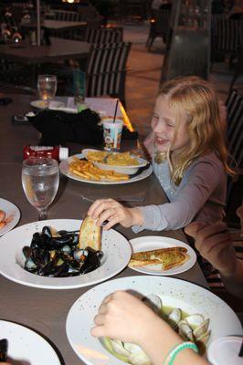 My girl might not be a mussel fan, but she loves soaking up the liquid with the toast.