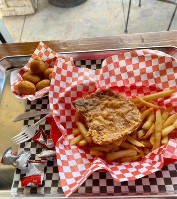 Lunch pork chop combo with side of hush puppies