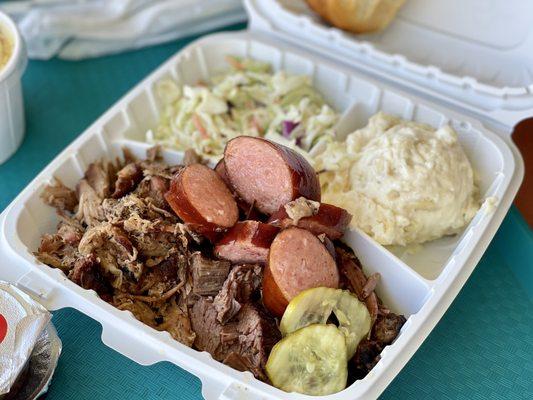 Triple meat plate. Pulled Pork, brisket, sausage, Slaw, Mac N Cheese