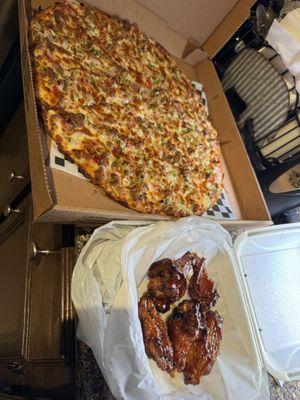 Supreme pizza and teriyaki wings