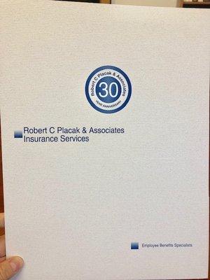 Robert C Placak & Associates employee benefits folder printed by Ram Print