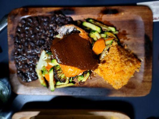 Salmon with mole, black beans and rice