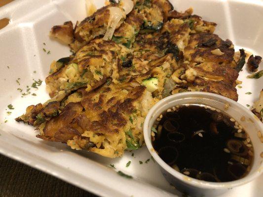 The kimchi pajeon (Korean pancake) is huge and delicious! Try it out as a side dish or appetizer.