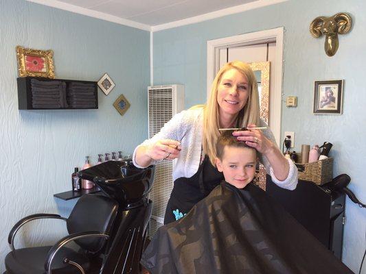 Aiden gets his haircut!! Love Ellie's Place!!