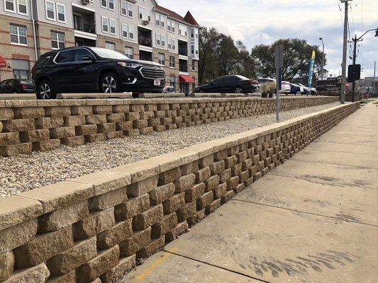 Two tiered rock retaining wall built by Herstad landscaping.