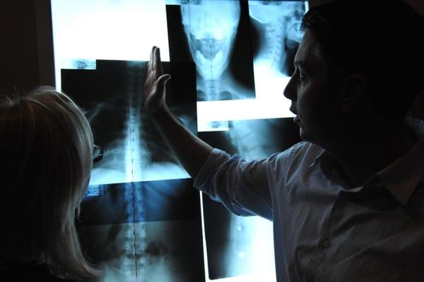 Reviewing x-ray results with a patient.