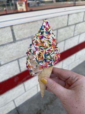 Small twist cone with rainbow sprinkles