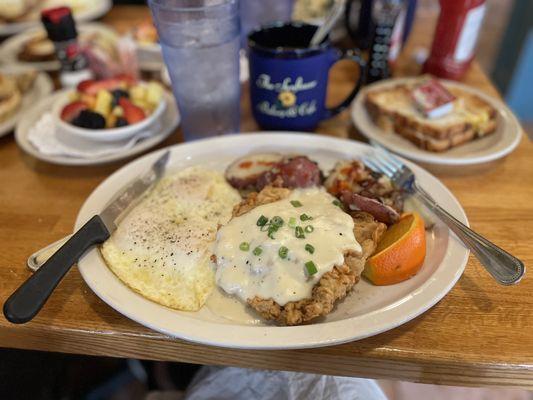 Chicken fried steak and eggs.