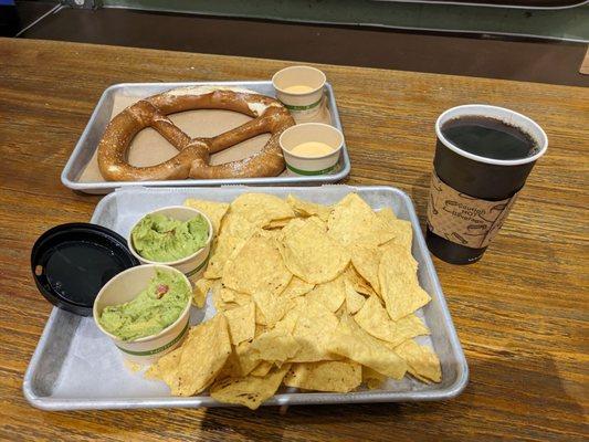 Chips and guacamole, pretzel with cheese (normally has one cheese one mustard but it's too spicy for the kids), and drip coffee.