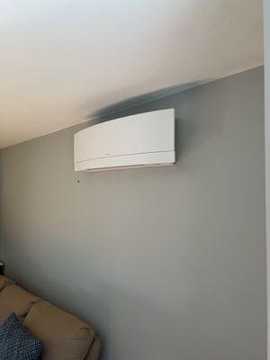 This is a Daikin Emura series highwall mounted unit, this European design is great for the aesthetic of the home