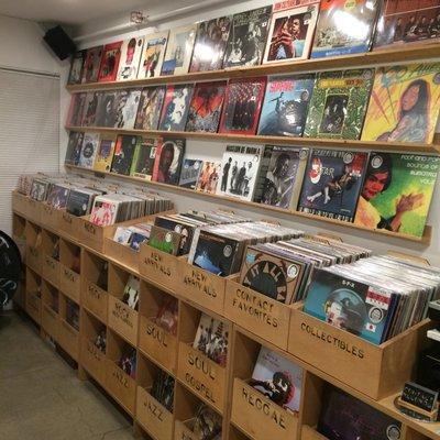 The drawer-bins let us fit a TON of records into our cozy shop!