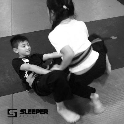 Sleeper Kids working no gi guard passing.