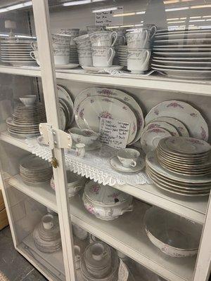 Look at this beautiful display of China dishes! It's one of several!