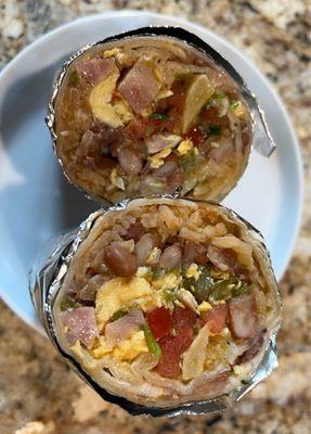 Breakfast burrito with ham, potatoes and cactus. Try it with the habenaro salsa!