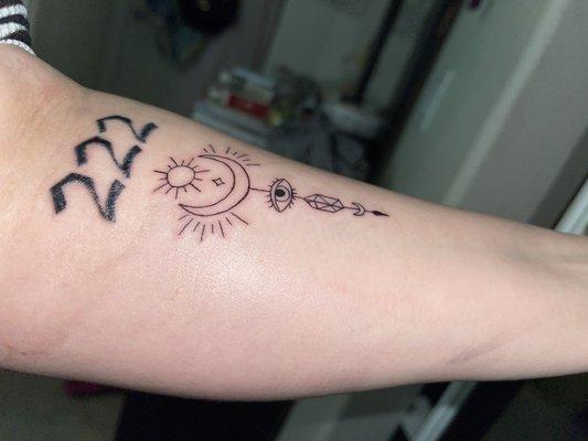 Retouched 222 and third eye forearm tattoo