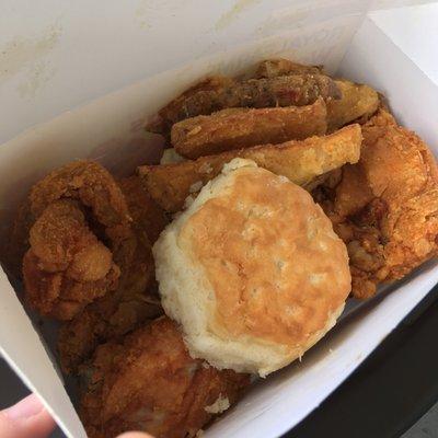 4 piece chicken meal with potato wedges and biscuit