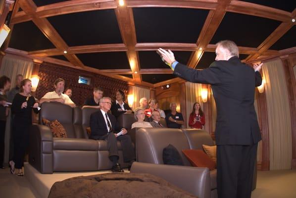 Demonstrating the visual and acoustical features of a true home theater installation