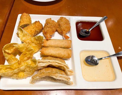 UDON SAMPLER
 A combination of 2 spring rolls, 2 crab Rangoon, 2 pot stickers, 2 butterfly shrimp, 1 chicken egg roll.