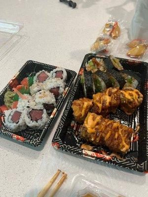 Sushi rolls left to right: tuna, dynamite, and shrimp tempura