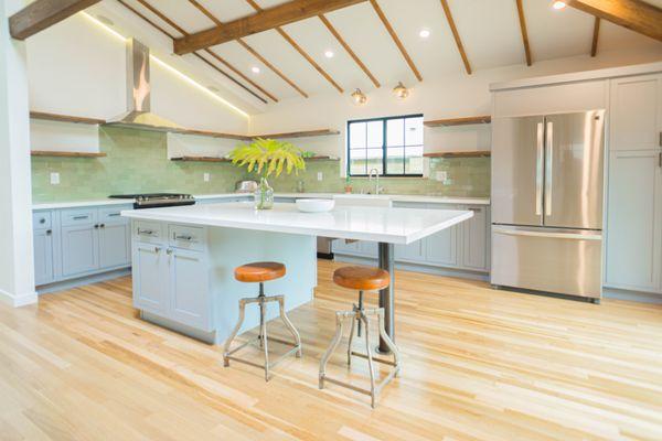 Serene Sage Kitchen! Contrasting our light grey kitchen cabinet line with our white cabinet line on top makes for a beautiful style.