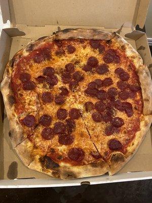 Double pepperoni with extra sauce.