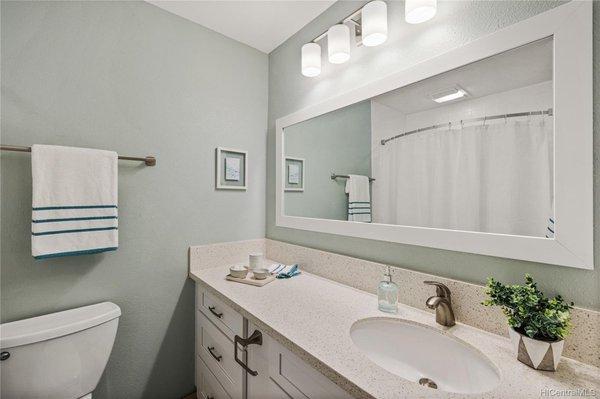 Primary bath - cabinets, hardware, paint, tile floor, mirrors, lighting