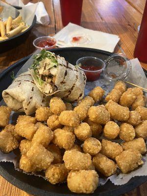 I go the Caesar salad wrap with tots