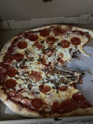 Large extra cheese, pepperoni and ground beef pizza.