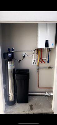 Finish plumbing water softener and tankless water heater with recirculation line for instant hot water ....