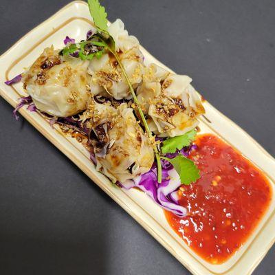 Kanom Jeeb, Appetizer. Ground pork wrapped in a wonton skin, steamed, and served with our house special sauce. Join us for great Thai Food.