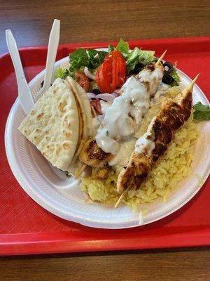 Chicken kabob platter with Greek salad