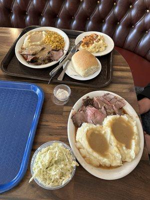 Table top view of roast beef dinners