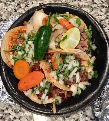 Barbacoa, lengua, carnitas and pollo tacos $5.92