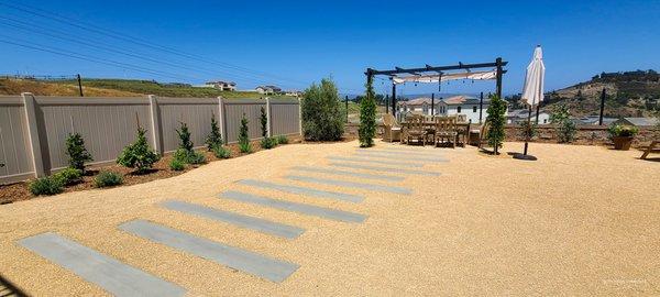 Gravel and custom concrete walkway