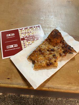 Slice of cheese pizza while I waited plus a coupon for next time