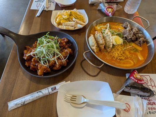 Beef Brisket tteokkboki with popcorn chicken and fries