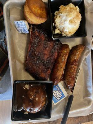 East Texas sausage, Memphis ribs, Mac and cheese, mash potatoes and gravy!  What a tremendous platter!