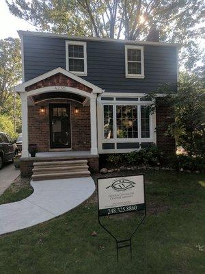 New porch and siding.