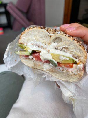 Everything bagel with cream cheese tomato cucumber and avocado