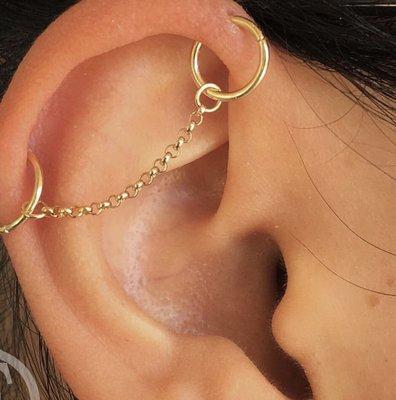 We took this healed industrial and added some gold hoops and chain for something a bit different