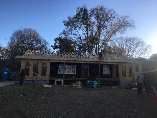 original structure gets new roof to connect additions to original edifice