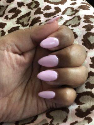 Medium almond shape nails, light pink color.