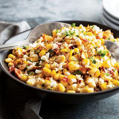 Sweet corn and roasted red peppers mixed with lime crema and topped with Feta cheese and fresh herbs