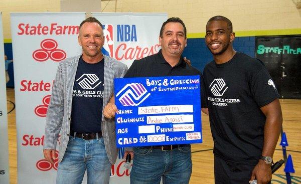 State Farm, The NBA Cares and The Chris Paul Family Foundation making a donation to the Andre Agassi Boys and Girls Club