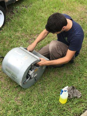 Cleaning AC Blower. Getting down and dirty to guarantee that your system is clean and up and running to max efficiency