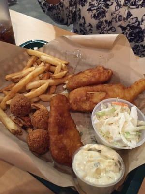 Fish basket with coleslaw and hush puppies