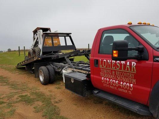 We can haul your equipment.  Cal us at 512-926-4603